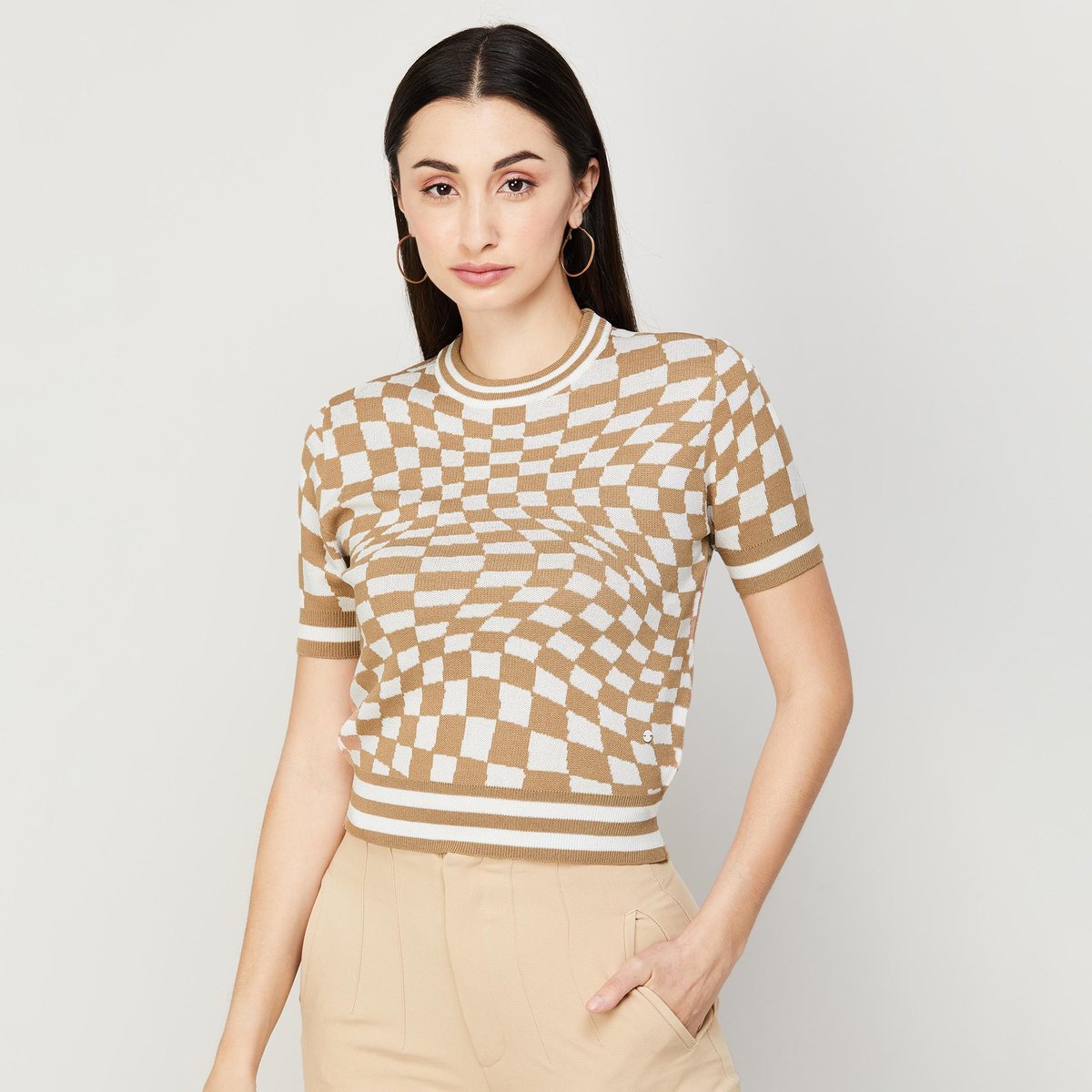 Chic Checkered Knit Top with Beige Slim-Fit Trousers