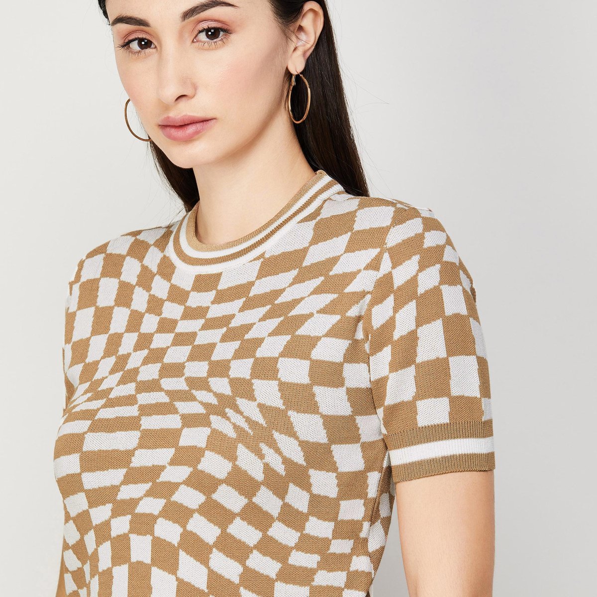 Chic Checkered Knit Top with Beige Slim-Fit Trousers